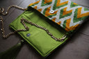 Gold Chain Bag Strap styled with clutch